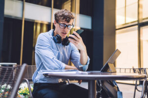 UCaaS Male Worker at Desk